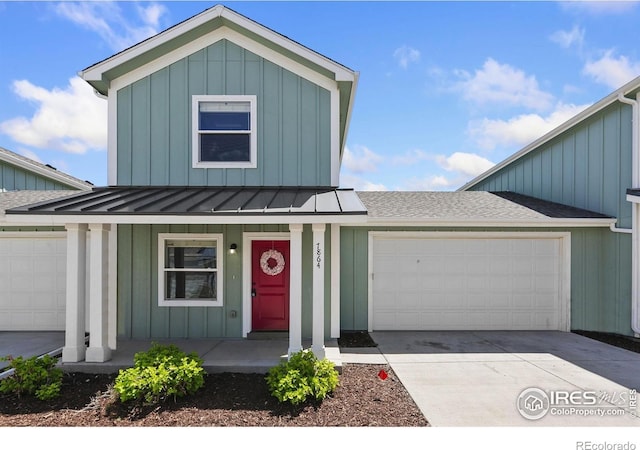 7864 5th St, Wellington, CO 80549 - modern farmhouse style home featuring board and batten siding, covered porch, a standing seam roof, a garage, and roof with shingles