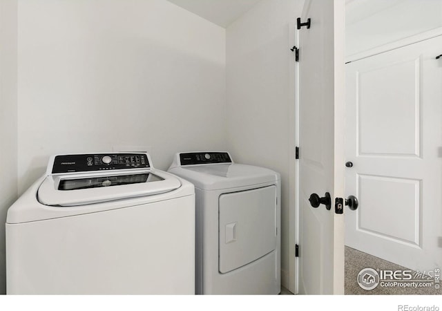 7864 5th St, Wellington, CO 80549 - laundry area featuring washing machine and dryer