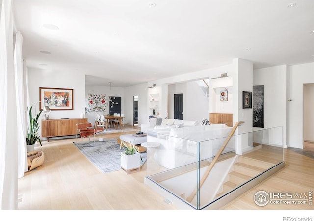 living area featuring wood finished floors