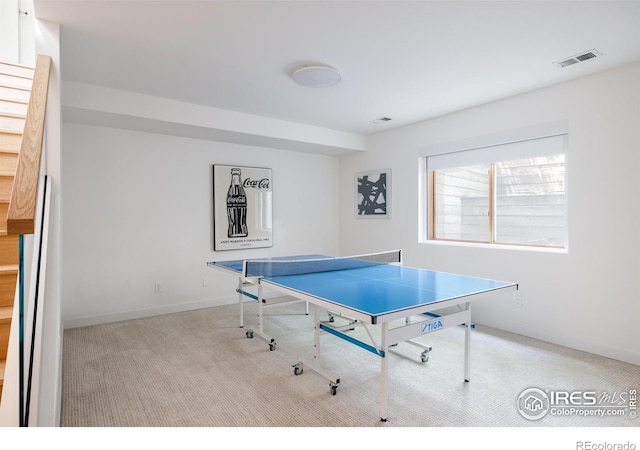 game room featuring carpet floors and baseboards