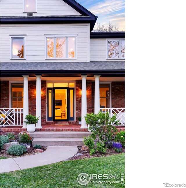 2835 Links Dr, Boulder, CO 80301 - entrance to property with brick siding and covered porch