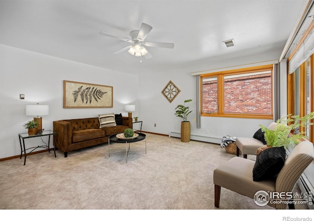 4560 Larkbunting Dr Unit 5D, Fort Collins, CO 80526 - living room featuring carpet, a baseboard heating unit, a ceiling fan, and baseboards
