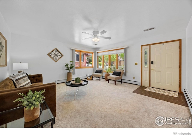 4560 Larkbunting Dr Unit 5D, Fort Collins, CO 80526 - carpeted living room with ceiling fan and a baseboard heating unit
