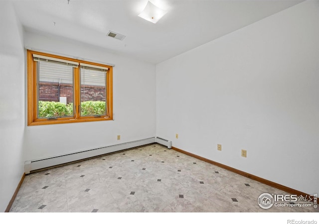 4560 Larkbunting Dr Unit 5D, Fort Collins, CO 80526 - spare room featuring baseboard heating and baseboards