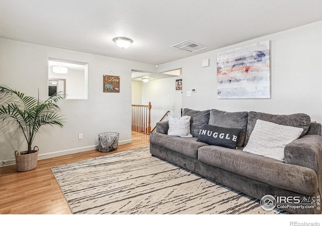 1970 Willow St, Denver, CO 80220 - living room with wood finished floors and baseboards