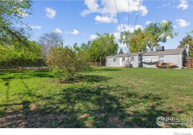 1970 Willow St, Denver, CO 80220 - view of yard with an outdoor fire pit