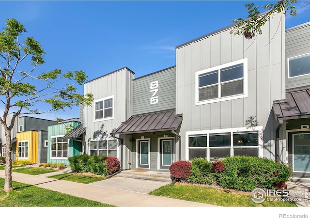 875 Baum St Unit C, Fort Collins, CO 80524 - view of front facade with a standing seam roof, board and batten siding, and metal roof