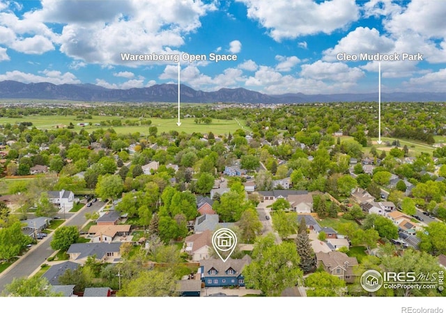 aerial view of residential area with a mountain backdrop