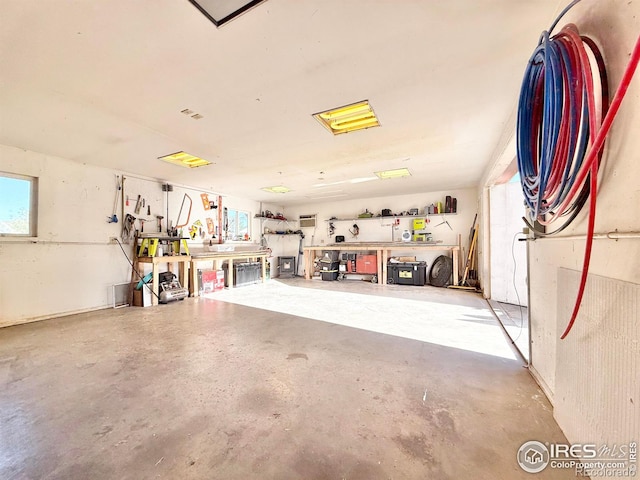 garage featuring a workshop area