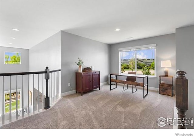 office area featuring plenty of natural light, carpet, baseboards, and recessed lighting