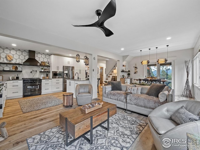 370 Big Boulder Dr, Estes Park, CO 80517 - living area featuring stairway, light wood-style flooring, recessed lighting, and a ceiling fan