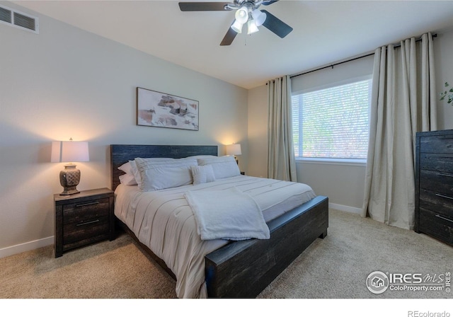 489 Hayloft Way, Brighton, CO 80601 - bedroom with light carpet, baseboards, and ceiling fan