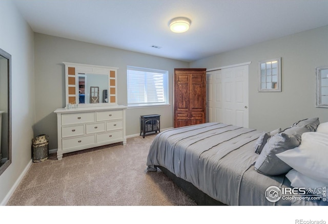 489 Hayloft Way, Brighton, CO 80601 - carpeted bedroom featuring baseboards and a closet