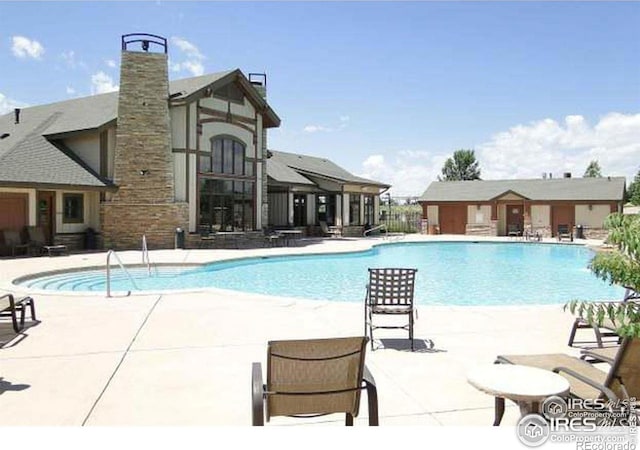community pool with a patio