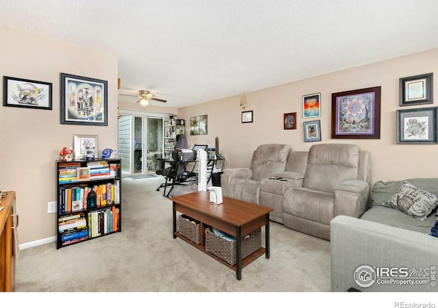 2709 Harvard St Unit 3, Fort Collins, CO 80525 - carpeted living area featuring a ceiling fan