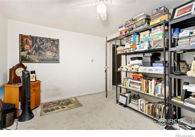 2709 Harvard St Unit 3, Fort Collins, CO 80525 - carpeted office space featuring a ceiling fan and a textured ceiling