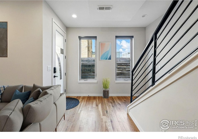 2625 W 25th Ave Unit 7, Denver, CO 80211 - entryway with light wood-style floors, stairway, baseboards, and recessed lighting