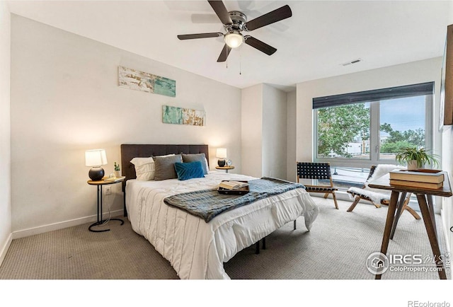 2625 W 25th Ave Unit 7, Denver, CO 80211 - bedroom featuring carpet floors, baseboards, and a ceiling fan