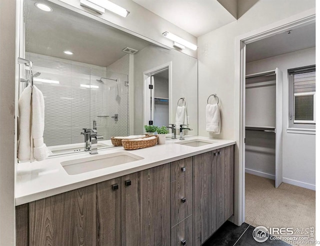 2625 W 25th Ave Unit 7, Denver, CO 80211 - full bath featuring a stall shower, double vanity, baseboards, and recessed lighting