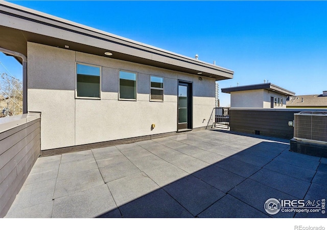 2625 W 25th Ave Unit 7, Denver, CO 80211 - view of patio with central AC