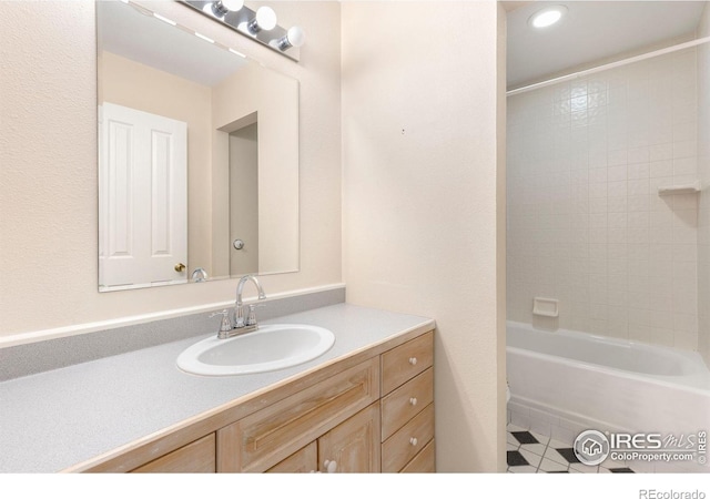 10481 Oxford Rd, Longmont, CO 80504 - full bath with vanity and tile patterned floors