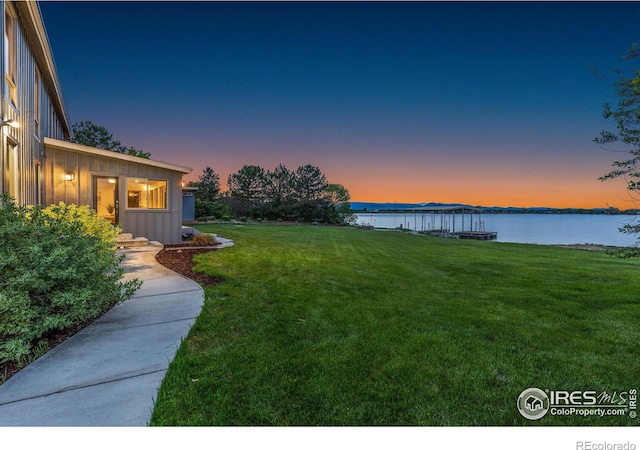 10481 Oxford Rd, Longmont, CO 80504 - view of grassy yard featuring a water view