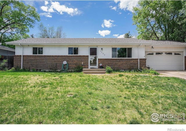 single story home with brick siding, a garage, and a front yard