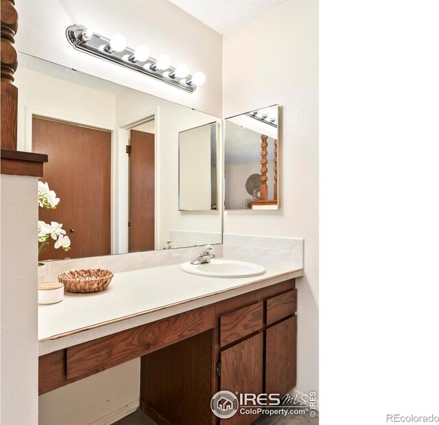 821 Hayden Ct, Longmont, CO 80503 - bathroom featuring vanity