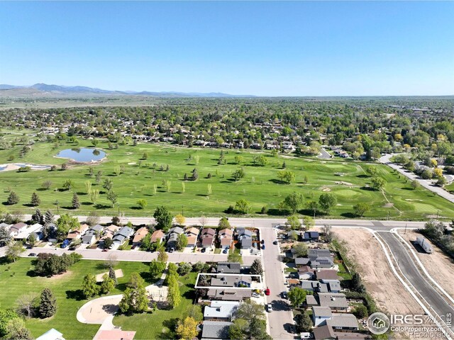 821 Hayden Ct, Longmont, CO 80503 - aerial view of residential area featuring a water and mountain view and a golf club