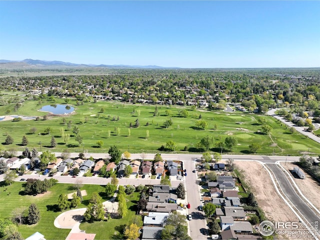 821 Hayden Ct, Longmont, CO 80503 - aerial view of residential area featuring a water and mountain view and a golf club