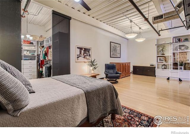 bedroom featuring wood finished floors