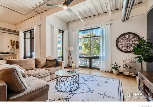 1360 Walnut St Unit 202, Boulder, CO 80302 - living area with wood-type flooring, a ceiling fan, and french doors