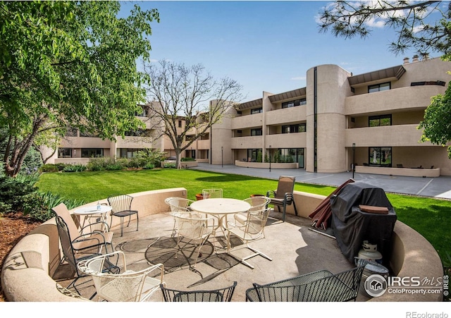 view of patio with a grill