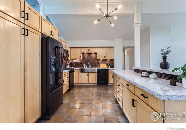 3410 Heidelberg Dr, Boulder, CO 80305 - kitchen featuring light brown cabinetry, black appliances, a sink, a chandelier, and decorative backsplash