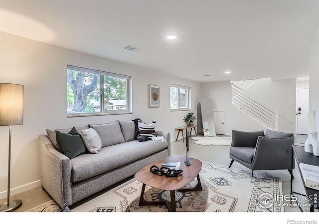 3410 Heidelberg Dr, Boulder, CO 80305 - living area with stairs, arched walkways, recessed lighting, and baseboards