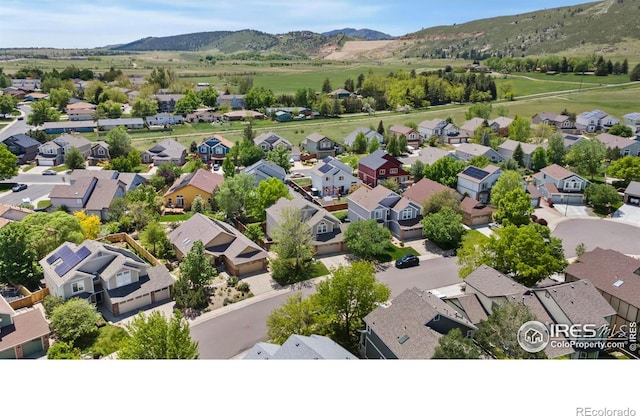 3227 Honeysuckle Ct, Fort Collins, CO 80521 - aerial perspective of suburban area with a mountainous background