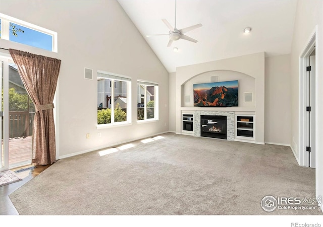 3227 Honeysuckle Ct, Fort Collins, CO 80521 - unfurnished living room with high vaulted ceiling, plenty of natural light, ceiling fan, carpet flooring, and baseboards