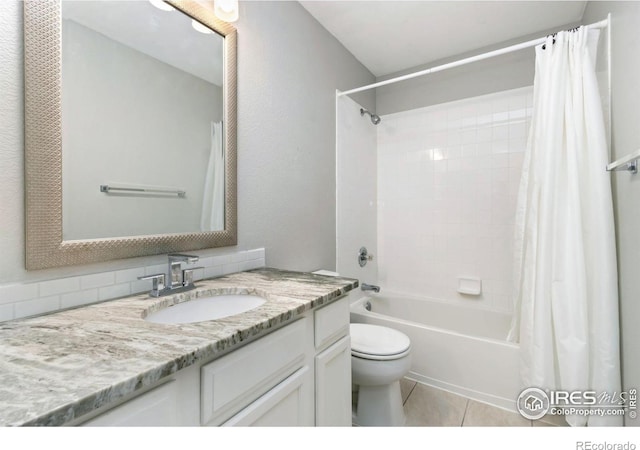 3227 Honeysuckle Ct, Fort Collins, CO 80521 - bathroom with toilet, shower / bath combo with shower curtain, vanity, tile patterned floors, and decorative backsplash