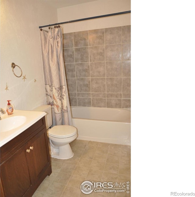 full bathroom with shower / tub combo, toilet, and vanity