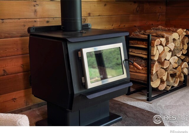 detailed view of wooden walls and a wood stove