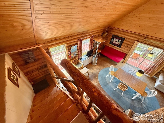 4911 Storm Mountain Dr, Drake, CO 80515 - living room with log walls, wood ceiling, and high vaulted ceiling