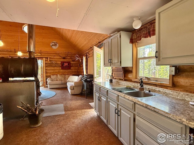 4911 Storm Mountain Dr, Drake, CO 80515 - kitchen featuring a sink, plenty of natural light, vaulted ceiling, open floor plan, and wood ceiling