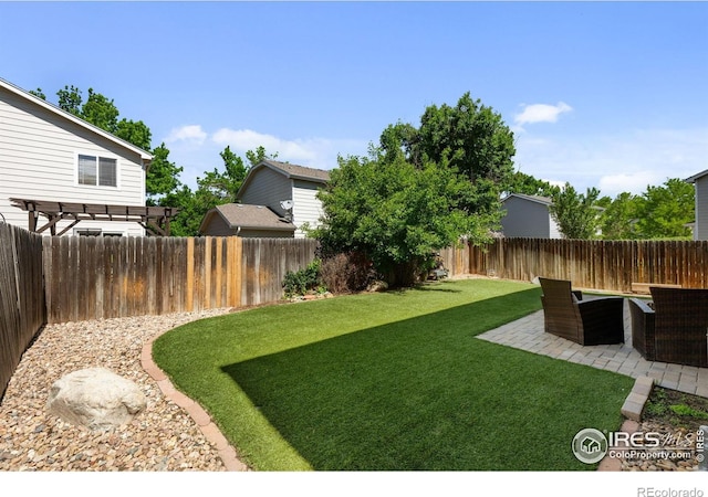 view of yard featuring a pergola and a patio