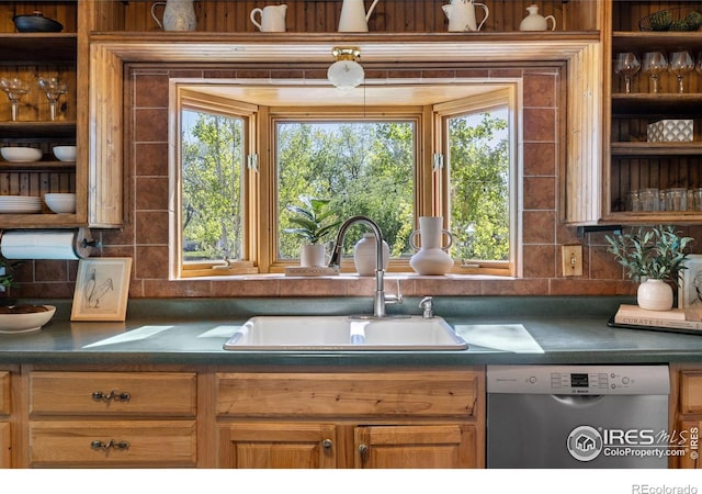 4743 Jay Rd, Boulder, CO 80301 - kitchen featuring stainless steel dishwasher, a sink, dark countertops, and backsplash