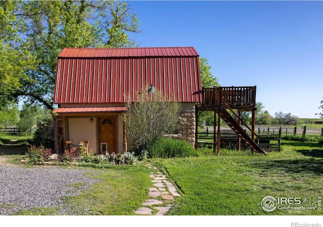 4743 Jay Rd, Boulder, CO 80301 - view of front of house with a gambrel roof, metal roof, and stairs