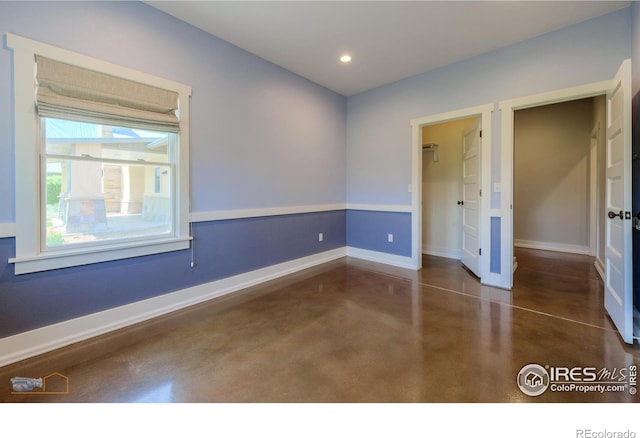 23111 County Road 1, Berthoud, CO 80513 - empty room with concrete flooring, baseboards, and recessed lighting