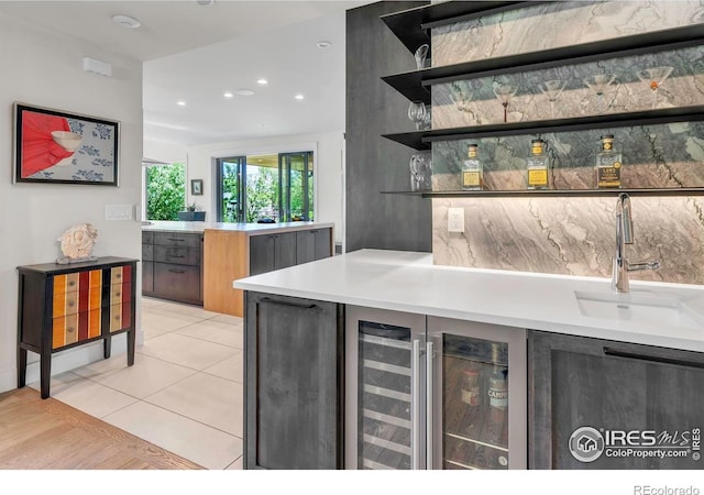 indoor dry bar with recessed lighting and light tile patterned flooring