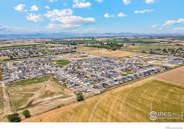 drone / aerial view of a mountainous background