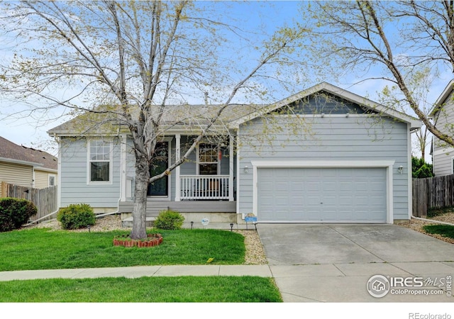 4312 Windmill Dr, Brighton, CO 80601 - single story home with driveway, a garage, and covered porch