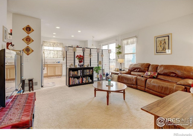 4312 Windmill Dr, Brighton, CO 80601 - living room with carpet, healthy amount of natural light, and recessed lighting